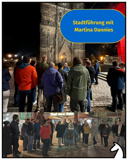Foro von der Stadtführung mit Martina Dannies vom USC Magdeburg. Im Hintergrund ist eine Kirche zu sehen.